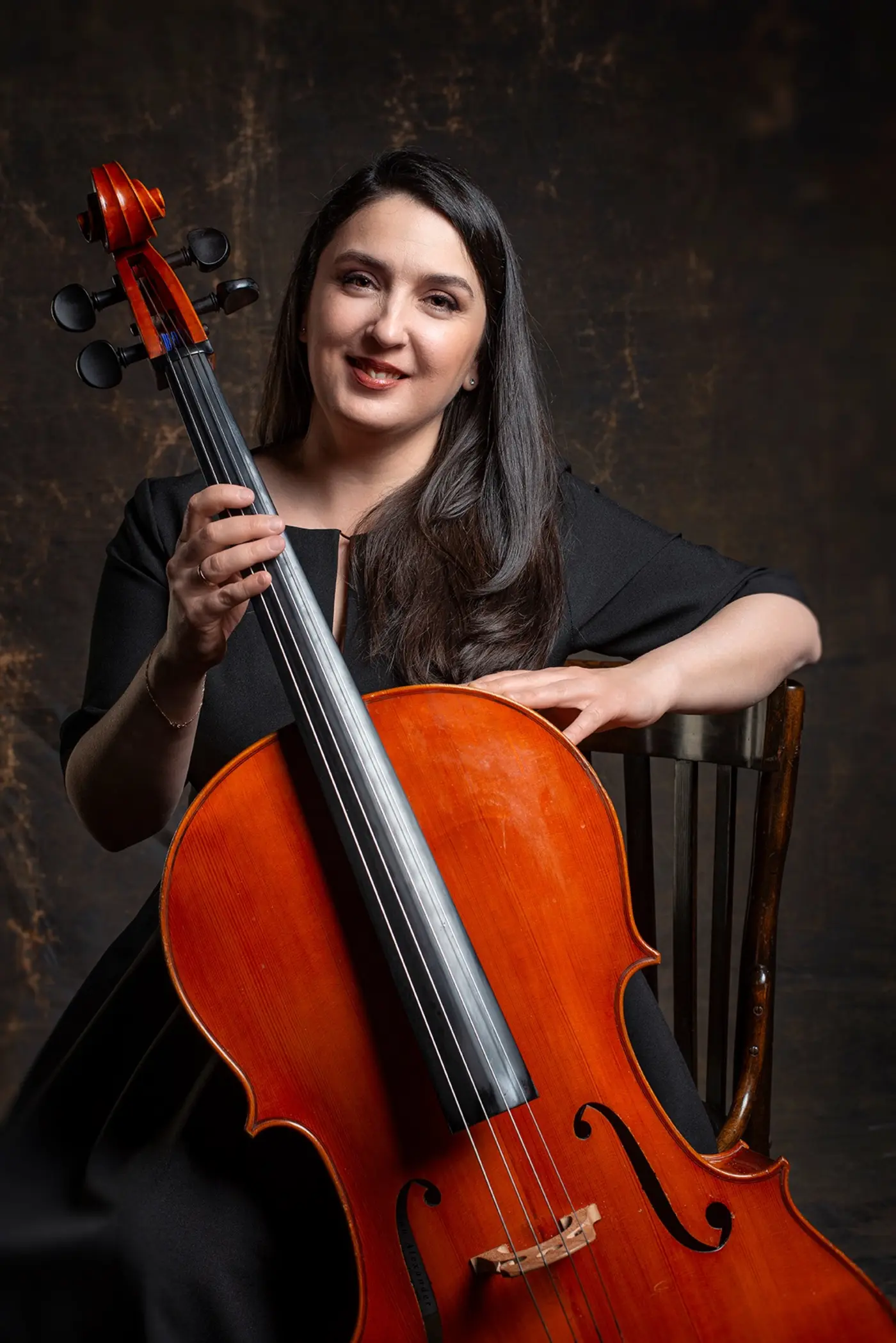 Irina with cello in the studio